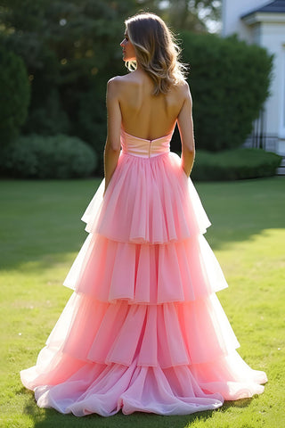 Robe de bal longue rose bustier à volants et coupe trapèze