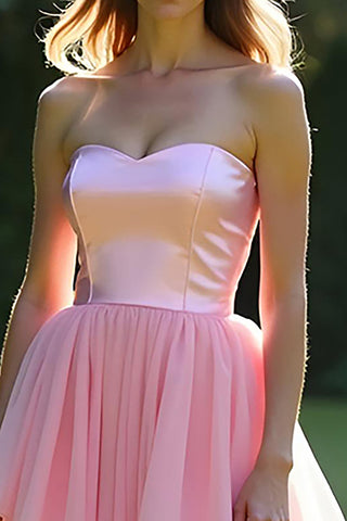 Robe de bal longue rose bustier à volants et coupe trapèze