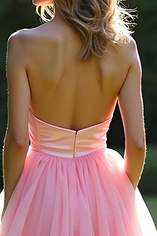 Robe de bal longue rose bustier à volants et coupe trapèze