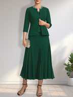 Vestido de novia de gasa, corte línea A, escote redondo, largo té, con lentejuelas y pedrería. 