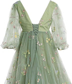 Robe de maternité en tulle brodé, idéale pour une séance photo, une robe de bal fendue ou une baby shower. 