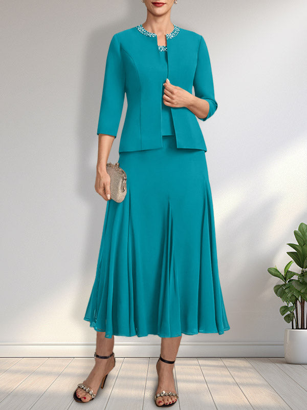Vestido de novia de gasa, corte línea A, escote redondo, largo té, con lentejuelas y pedrería. 