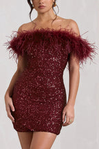 Robe moulante mini à sequins et plumes « It's Show Biz » 