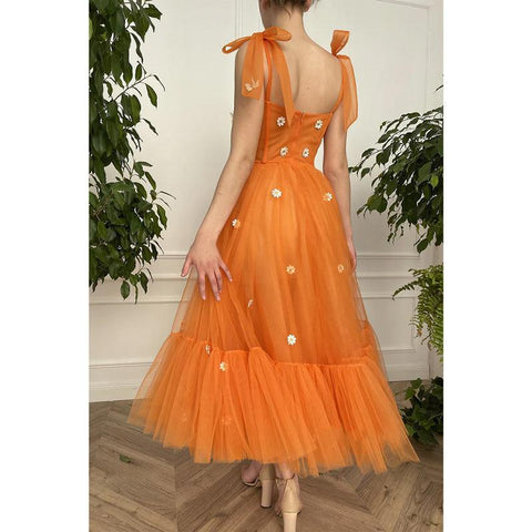 Robe de bal longue trapèze à bretelles spaghetti et décolleté en cœur avec poches 