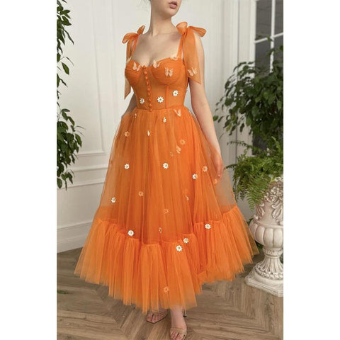Robe de bal longue trapèze à bretelles spaghetti et décolleté en cœur avec poches 