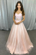 Vestido de graduación rosa con corsé, escote corazón y corte en A con apliques