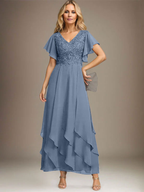Vestido de novia de corte línea A, escote en V, largo hasta el tobillo, de gasa de encaje con volantes en cascada. 