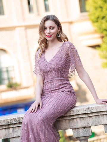 Vestidos de noche formales de lujo con escote en V estilo sirena, bordados con cuentas, manga corta y largo hasta el suelo de Baoleely. 