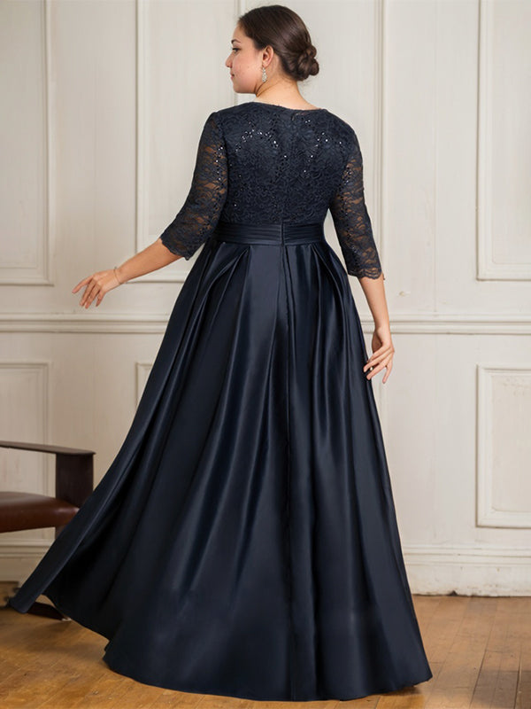 Vestido de novia de satén con encaje, corte en A, escote en V y largo hasta el suelo, con lazo de lentejuelas. 