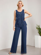 Vestido de novia de gasa con encaje y lentejuelas, estilo mono/pantalón, largo hasta el suelo, con escote redondo.