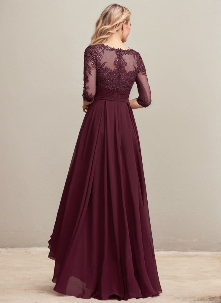 Vestido de madrina de la novia, corte en A, escote redondo ilusión, asimétrico, de encaje y gasa con lentejuelas plisadas. 