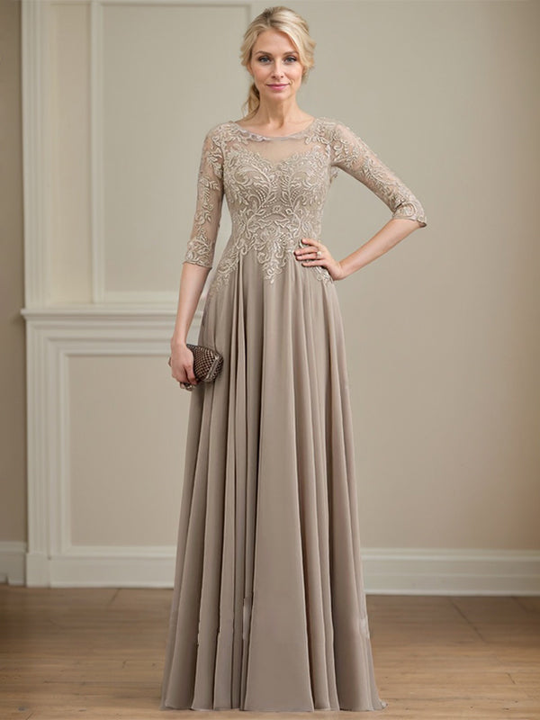 Vestido de novia de corte A, escote redondo, ilusión, largo hasta el suelo, de encaje y gasa con lentejuelas. 