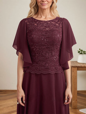 Vestido de novia de corte A, escote redondo, ilusión, largo hasta el suelo, de encaje y gasa con lentejuelas. 