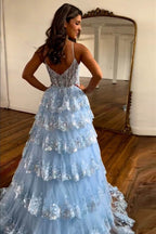 Robe de bal bleue à bretelles spaghetti et corset, coupe princesse, ornée de volants en dentelle