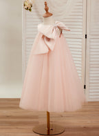 Vestido de niña pequeña de las flores, corte en A, con gran lazo y tul, hasta la rodilla. 