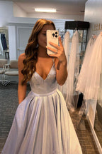 Robe de bal longue à paillettes avec poches