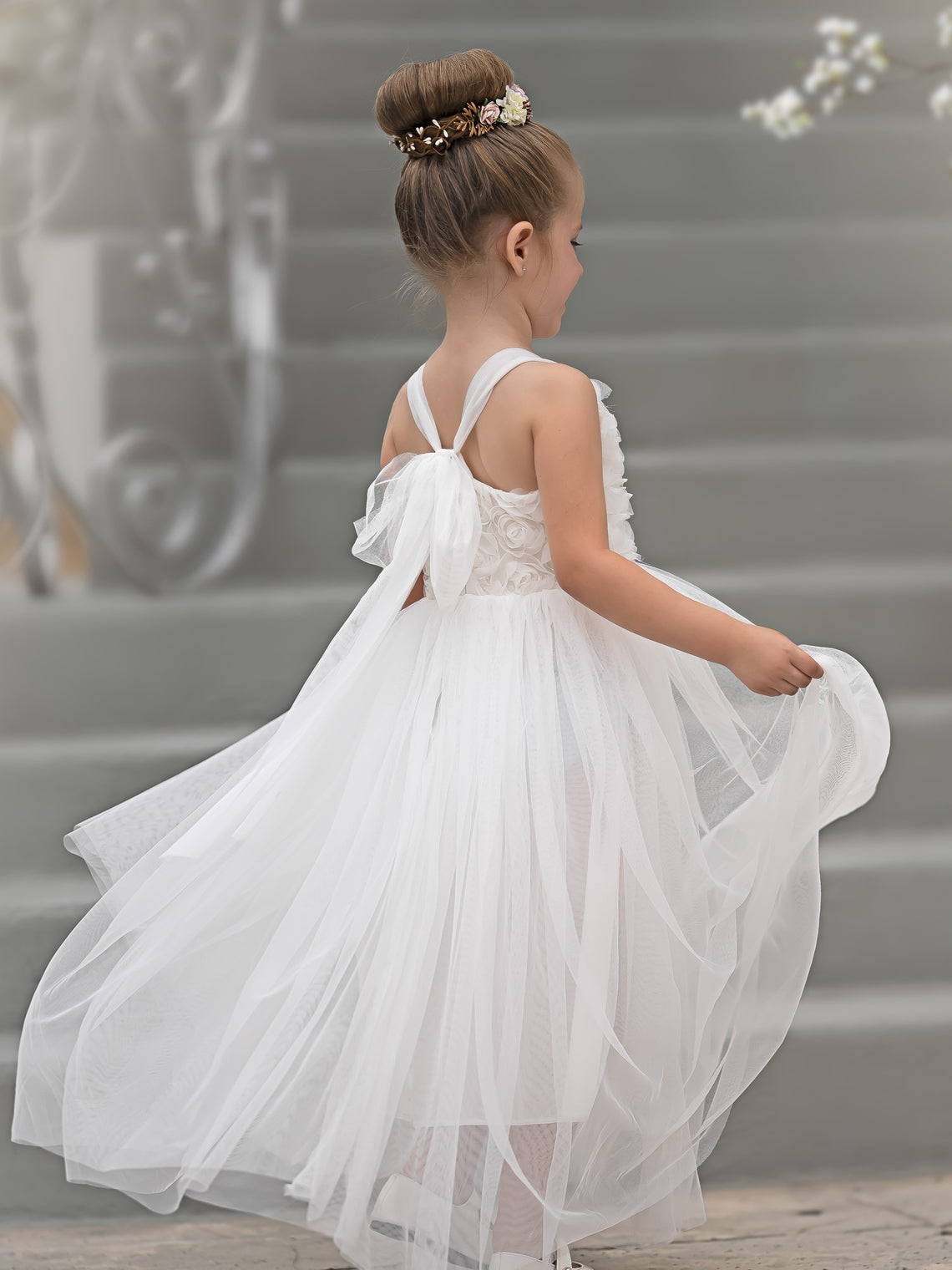 Vestido de bebé niña con lazo de tul y aplique floral en 3D de la colección Jardín Encantado 