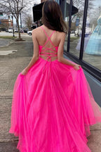 Robe de bal longue en tulle rose fuchsia, coupe trapèze, avec poches