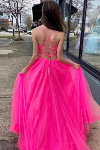 Robe de bal longue en tulle rose fuchsia, coupe trapèze, avec poches