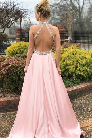Robe de bal longue rose sans manches à col halter ornée de cristaux