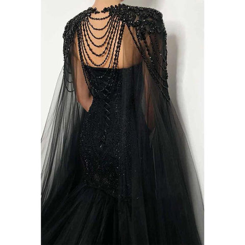 Robe de soirée sirène noire sexy à col en V profond et perles avec traîne 