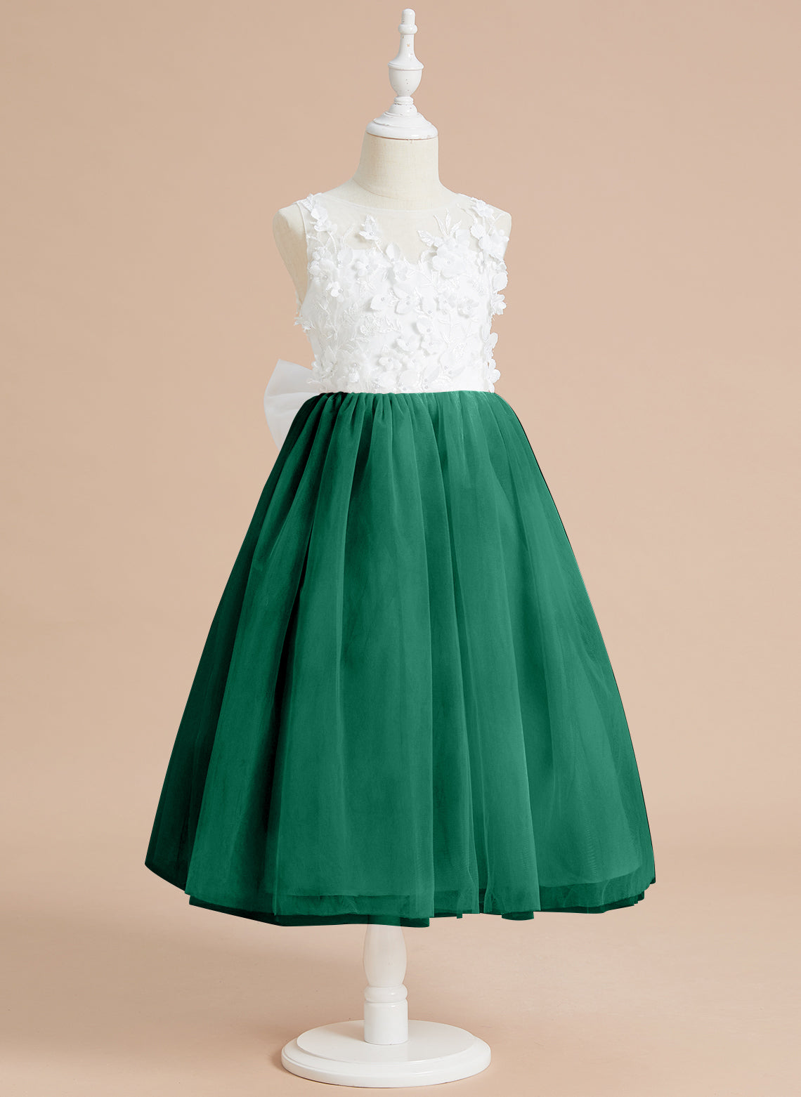 Vestido midi de encaje floral y lazo grande 