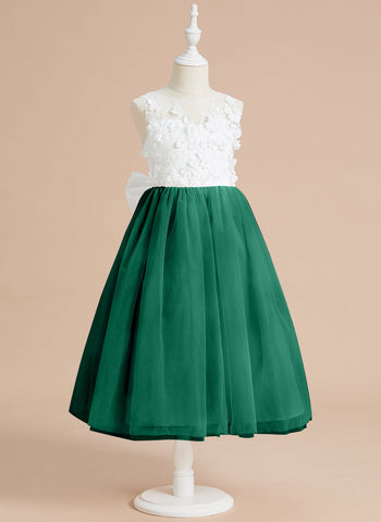 Vestido midi de encaje floral y lazo grande 