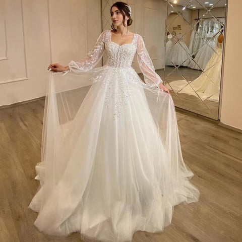 White Wedding Dresses Sweetheart Shiny Appliques Grace Bridal Gowns 2023 Puff Sleeve Tulle A-Line Princess Robe De Marié