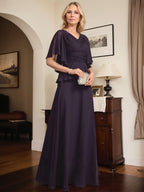 Vestido de gasa de corte A, escote en V, largo hasta el suelo, para la madre de la novia, con plisados ​​y cuentas.