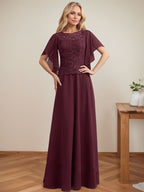 Vestido de novia de corte A, escote redondo, ilusión, largo hasta el suelo, de encaje y gasa con lentejuelas. 