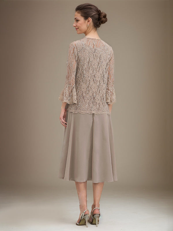Vestido de novia de corte línea A, escote redondo, largo hasta la rodilla, de encaje y gasa con lentejuelas. 