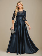 Robe de mariée longue en satin stretch dentelle et dentelle, coupe trapèze, décolleté illusion, ornée d'un nœud à sequins 