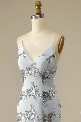 Robe de bal dos nu à fines bretelles ornée de perles