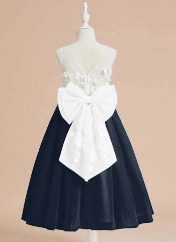 Vestido midi de encaje floral y lazo grande 