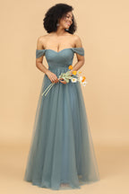 Robe de demoiselle d'honneur en tulle à épaules dénudées et à volants