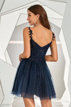Robe de cocktail courte dos nu avec appliques
