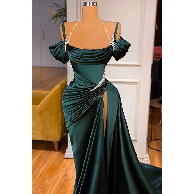 Robe de soirée longue trapèze à bretelles spaghetti et perles avec fente