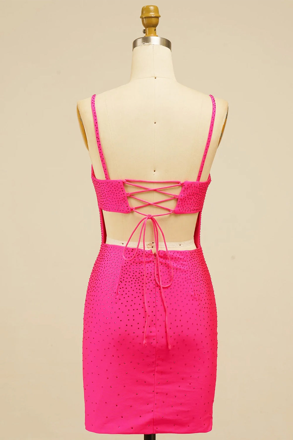 Robe de bal courte moulante à lacets et sequins