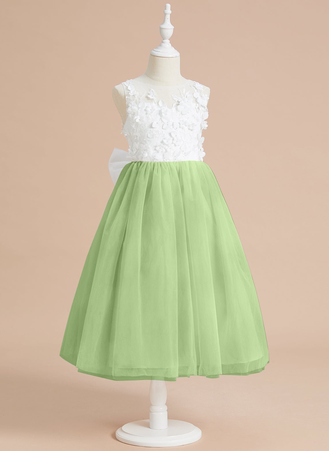 Vestido midi de encaje floral y lazo grande 