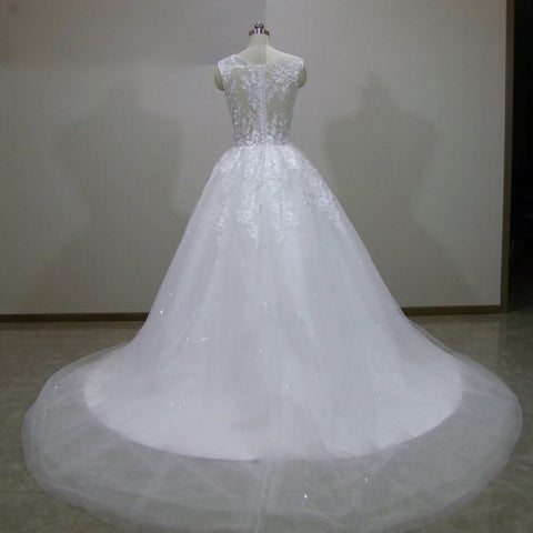 Vestido de novia bohemio de corte A con apliques de encaje y escote redondo, sin mangas, tul ilusión