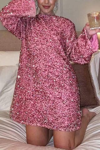 Robe mini ample à paillettes et nœud dans le dos, idéale pour danser toute la nuit 