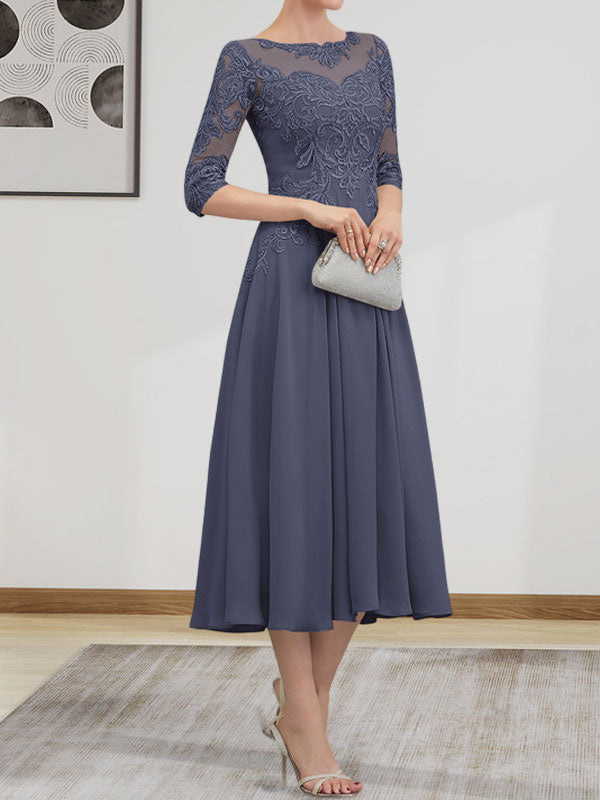 Vestido de novia de corte A, escote redondo ilusión, largo té, de gasa, encaje, con lentejuelas y pedrería.