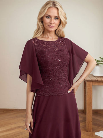 Vestido de novia de corte A, escote redondo, ilusión, largo hasta el suelo, de encaje y gasa con lentejuelas. 