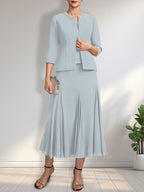 Vestido de novia de gasa, corte línea A, escote redondo, largo té, con lentejuelas y pedrería. 