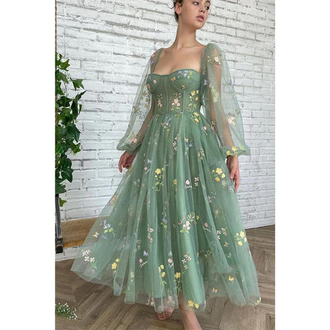 Robe de bal sexy en dentelle brodée à manches mi-longues et col en V avec poches