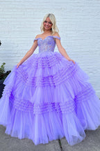 Robe de bal longue en tulle à épaules dénudées et à volants étagés
