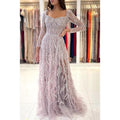 Glamoroso vestido de fiesta formal de sirena con mangas largas cuadradas y brillantes con plumas