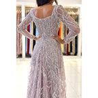 Glamoroso vestido de fiesta formal de sirena con mangas largas cuadradas y brillantes con plumas