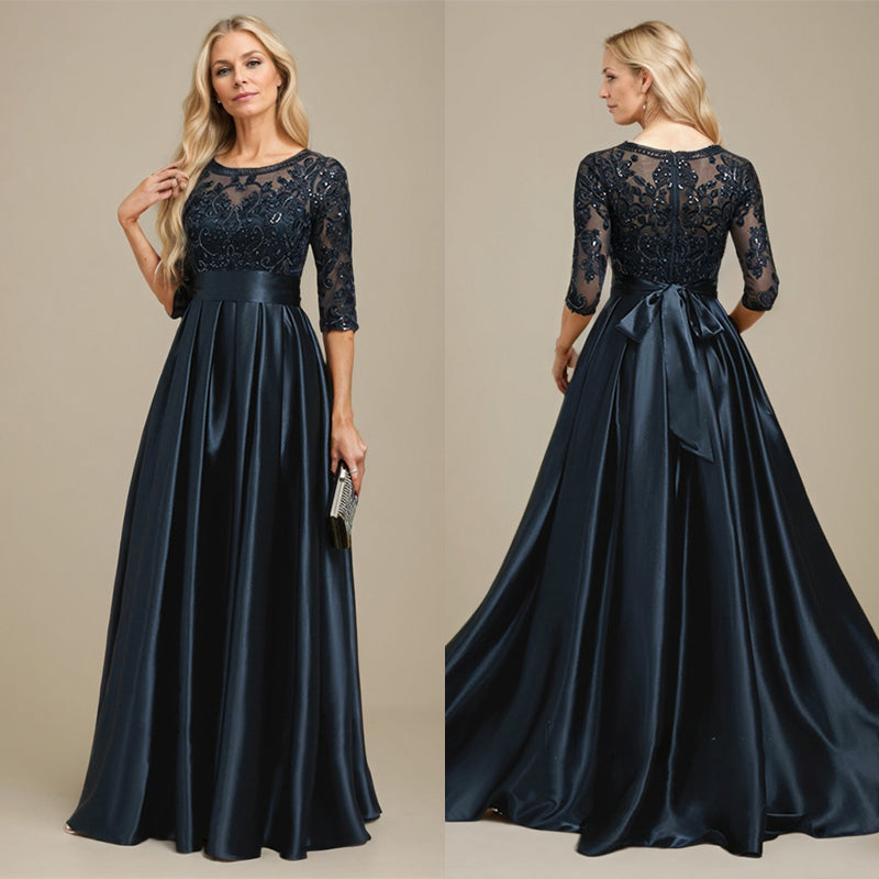 Robe de mariée longue en satin stretch dentelle et dentelle, coupe trapèze, décolleté illusion, ornée d'un nœud à sequins 