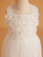 Vestido de bebé niña con lazo de tul y aplique floral en 3D de la colección Jardín Encantado 